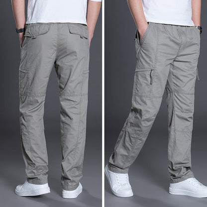 Gray cargo pants shown from front and back on a gray background