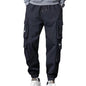 Black cargo pants worn by a person on a white background